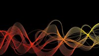 Abstract flowing wave lines in red orange yellow gradient colors on black background for modern digital design projects.