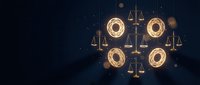 Glowing golden scales and balance symbols suspended in dark blue space, representing justice, law, fairness, and legal services for websites and marketing materials.