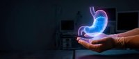 Holographic stomach organ floating above open palm in medical technology concept for healthcare innovation and digestive system education.