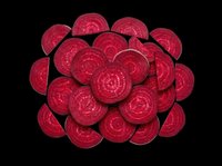 Fresh sliced beetroot pieces arranged in a pile, isolated on transparent background, ready for food design, stickers, print on demand, and T-shirt use.