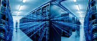 Young male technician in professional attire inspecting server racks in modern data center facility with blue lighting and advanced networking equipment.