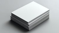 Stack of blank white paper sheets with soft shadow on light gray background, isolated mockup for business stationery and branding presentation.