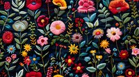 Vibrant floral pattern with colorful wildflowers, poppies, daisies and botanical elements on dark background creates romantic folk art style seamless design for fabric and decor.