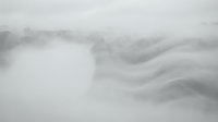 Soft gray clouds floating in overcast sky creating moody atmospheric background for weather forecasts and nature projects.