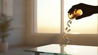 Silhouetted hand pouring golden liquid into glass against bright window, creating splashing effect in minimalist interior setting for beverage, wellness, and lifestyle concepts.