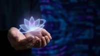Hands holding glowing lotus flower hologram against dark blue digital background for meditation wellness and spiritual technology concepts.