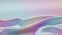 Smooth flowing waves in soft pastel colors creating an elegant abstract background with gradient transitions from purple to mint green tones.