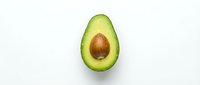 Fresh avocado half with pit isolated on white background, ready for culinary, nutrition, and healthy eating design projects.