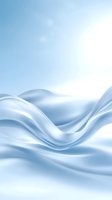 Flowing white silk fabric creates gentle waves against light blue background, soft folds catching highlights and shadows for elegant minimalist design.