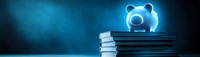 Glowing piggy bank on stack of books with blue lighting for financial education and savings concept.