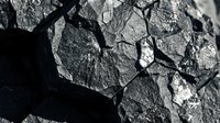 Cracked and dried earth surface with deep fissures creating natural geometric patterns, suitable for environmental, climate change, drought, and nature-related projects.