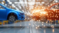 Blue and orange cars in auto repair garage with dramatic sparks flying between them, showcasing automotive collision or repair work in industrial setting.