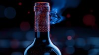 Wine bottle with condensation droplets on dark background with bokeh lights and rising steam, creating mysterious and elegant atmosphere for beverage photography.