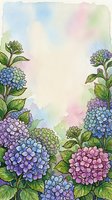 Watercolor hydrangea floral border frame with pastel blue, purple and pink blooms and green leaves, copy space for text or greeting card design.