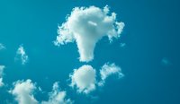 Fluffy white clouds floating in vibrant turquoise sky create natural abstract shapes against deep blue background, offering peaceful atmospheric scenery for nature designs.