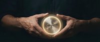 Mature male hands holding glowing compass with illuminated cityscape inside, symbolizing direction, navigation, and business guidance for corporate concepts.