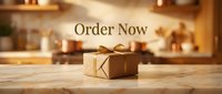 Kraft paper gift box with gold ribbon on marble counter, warm kitchen background, Order Now text for e-commerce and holiday promotions.