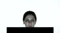 Young woman with bruised face showing domestic violence aftermath isolated on white background for awareness campaigns.