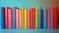 Colorful book spines arranged in rainbow order standing upright against turquoise background, creating minimalist composition with soft shadows and vibrant hues.