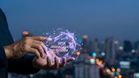Professional businessman holding glowing risk management system hologram with network connections over blurred city skyline at dusk for business strategy.