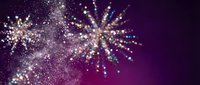Glowing particles burst outward in radiant starburst patterns against a deep purple gradient background, creating a festive, celebratory atmosphere for holiday and event designs.