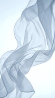 Flowing translucent fabric waves in soft blue and white tones against a clean white background. Isolated design element suitable for overlays, backgrounds, and creative projects.