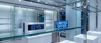 Modern retail store interior with glowing limited offer sign and digital clock on sleek glass shelves, conveying urgency and luxury shopping experience.