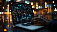 Dark laptop screen displaying financial analytics dashboard with glowing blue charts and graphs against blurred golden bokeh lights in evening atmosphere.