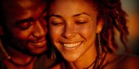 Young African American couple embracing in warm sunset light, woman with dreadlocks smiling with freckles, intimate romantic moment captured in golden hour glow.