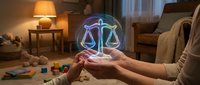 Woman holding glowing holographic scales of justice symbol in cozy living room representing legal balance, law firm services, and judicial fairness concepts.
