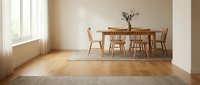 Modern minimalist dining room with wooden table and chairs on hardwood floor in bright natural light interior space for home design concepts.