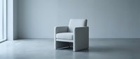 Modern minimalist armchair with white and dark gray upholstery in empty loft space with concrete floor and large window, suitable for interior design and furniture marketing.