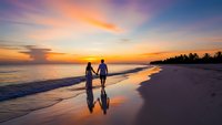 Romantic couple walking hand in hand on tropical beach at sunset with colorful sky reflecting on wet sand and palm trees in background for travel.