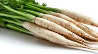 Fresh parsnips with green stems isolated on white background, suitable for food photography, cooking blogs, recipe websites, and culinary design projects.