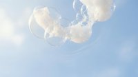Translucent jellyfish floating in blue ocean water with tentacles trailing below, suitable for marine life, aquatic, and nature-themed designs.