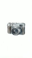 Vintage rangefinder camera with silver metal body and brown leather grip isolated on white background, suitable for retro design projects.