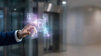 Businessman touching holographic customer experience interface with digital analytics icons in modern office environment for business technology solutions.