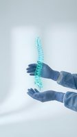 Medical professional hands in blue gloves holding holographic spine model for orthopedic diagnosis and treatment planning in modern healthcare setting.