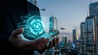 Hand holding glowing digital gear hologram over cityscape, representing technology innovation, digital transformation, and smart city solutions for business.