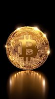 Golden cryptocurrency coin with glowing edges and reflection on dark background, symbolic representation of digital currency and blockchain technology.