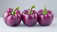 Fresh purple bell peppers with water drops lined up in row on light gray background, macro food photography showing vibrant color and texture detail.