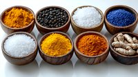 Wooden bowls filled with colorful spices, seasonings and ingredients including turmeric, black pepper, sea salt, ginger root and vibrant blue decorative sugar arranged in rows.