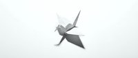 Origami paper crane bird folded from white paper on clean background. Minimalist Japanese art craft symbol of peace and hope for creative projects.