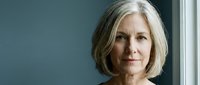 Mature woman with shoulder-length gray hair and fair complexion, professional appearance, suitable for corporate, healthcare, education, and lifestyle editorial use.