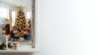 Decorated evergreen tree with warm lights visible through frosted window with holiday garland, creating festive seasonal atmosphere for celebrations and home decor.