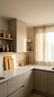 Modern minimalist kitchen interior with beige cabinets, open shelving, glass storage jars and warm natural lighting for contemporary home design.