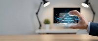 Businessman holding transparent glass card with certified professional badge and digital hologram effect in modern office workspace.