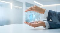 Businessman hands protecting holographic human figure with digital network connections in modern office environment for healthcare insurance concepts.
