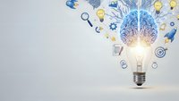 Light bulb with glowing brain and innovation icons floating above on white background representing creativity, ideas, and business solutions.