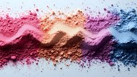 Colorful wave pattern made of crushed cosmetic powder in pink, peach, purple and blue shades on white background, makeup artist palette for beauty industry.